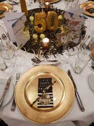 50-er Jahre party tischdeko schwarz gold.jpg